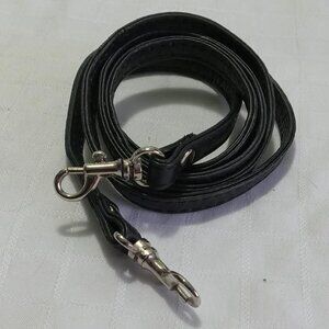 Leather strap/loop with hook fasteners 46 inches from one fastener to the other